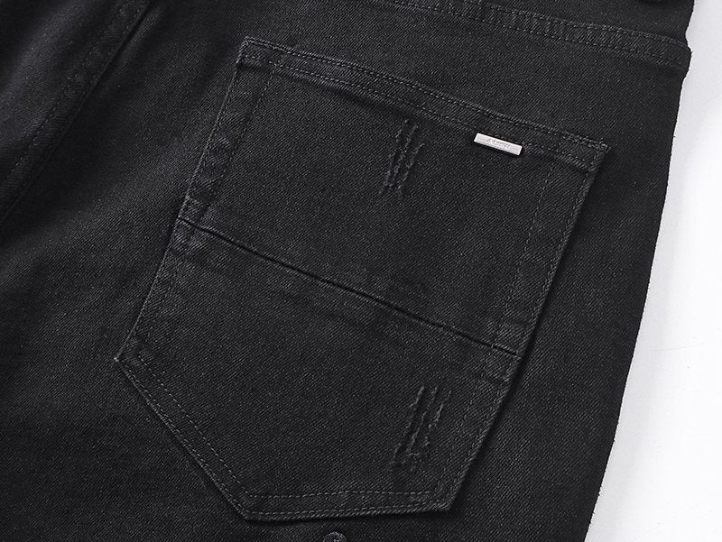 AMIRI Distressed Black Denim Shorts — detail