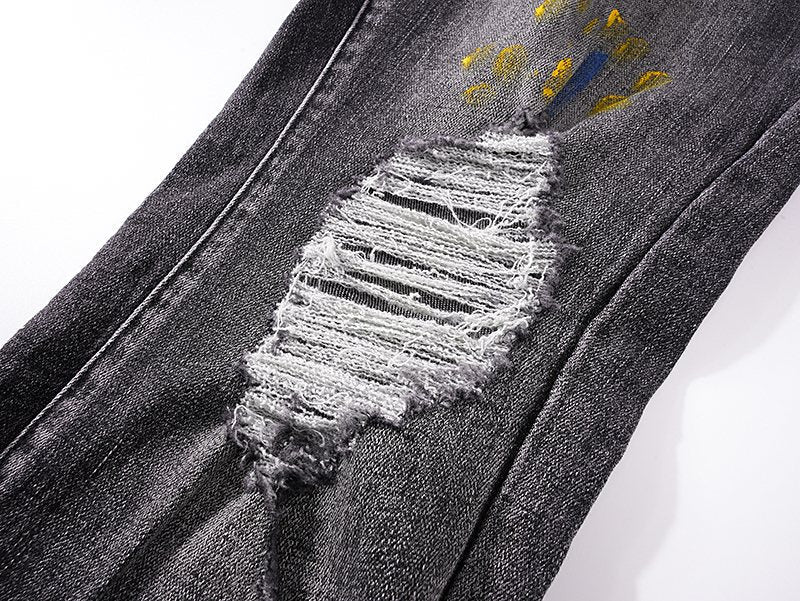 AMIRI Paint-Splatter Distressed Jeans — detail